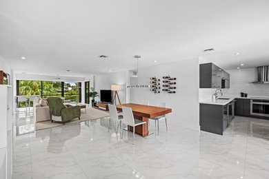 Enjoy sweeping golf course and lake views from this beautifully - photo 7