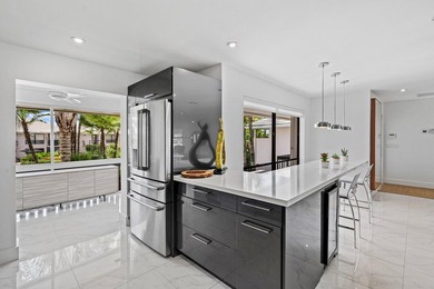 Enjoy sweeping golf course and lake views from this beautifully - photo 10