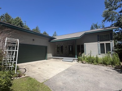 Enjoy lakeside living in this furnished, ranch-style home with - photo 2