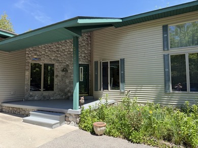 Enjoy lakeside living in this furnished, ranch-style home with - photo 3
