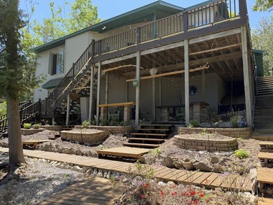 Enjoy lakeside living in this furnished, ranch-style home with - photo 4