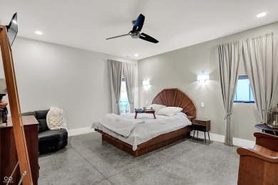 This exceptional 2-year-old barndominium offers modern country