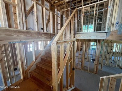 The 2604 floorplan is a stunning two-story home that offers 4 - photo 17