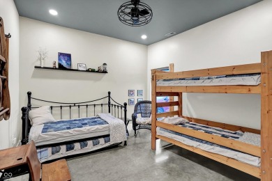 This exceptional 2-year-old barndominium offers modern country