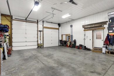 This exceptional 2-year-old barndominium offers modern country