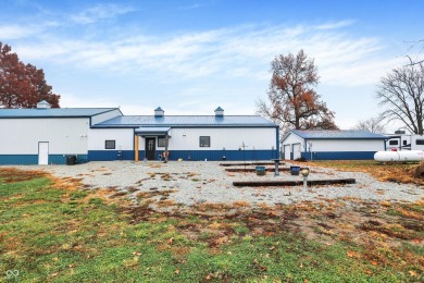 This exceptional 2-year-old barndominium offers modern country