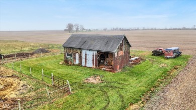 This exceptional 2-year-old barndominium offers modern country