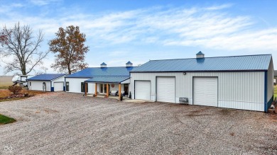 This exceptional 2-year-old barndominium offers modern country