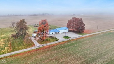 This exceptional 2-year-old barndominium offers modern country