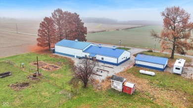 This exceptional 2-year-old barndominium offers modern country