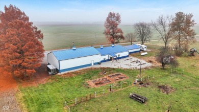 This exceptional 2-year-old barndominium offers modern country