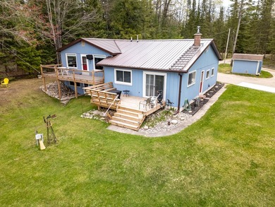 Rainy Lake Home Active Under Contract in Millersburg Michigan