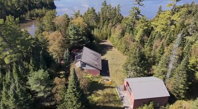 Set your sights on a rare find in the North Maine Woods. Located - photo 2