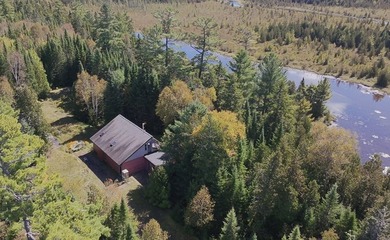 Set your sights on a rare find in the North Maine Woods. Located - photo 3