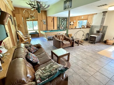 Set your sights on a rare find in the North Maine Woods. Located - photo 8