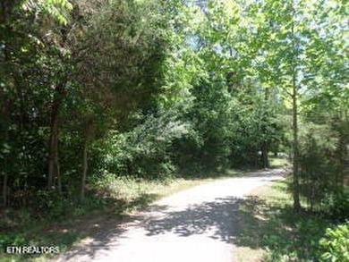 Ideal building homesite in Oak Ridge's upscale Rivers Run gated - photo 5