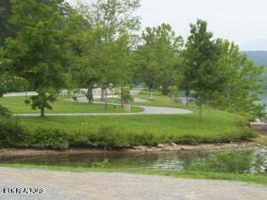 Ideal building homesite in Oak Ridge's upscale Rivers Run gated - photo 8