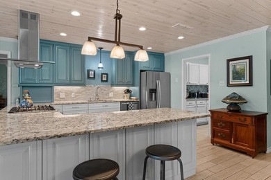 Lake life just got an upgrade! This beautifully updated - photo 15