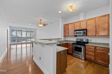 Move in ready condo at The Dawson, where modern elegance meets