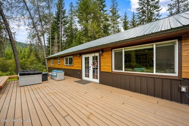 This serene 1.25 acre property on Lamb Creek offers 200 ft. of - photo 15