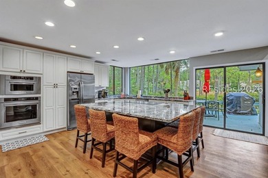 Unique home with a covered, heated pool and bi-fold doors that - photo 24