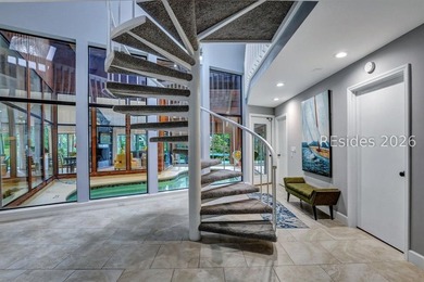 Unique home with a covered, heated pool and bi-fold doors that - photo 35