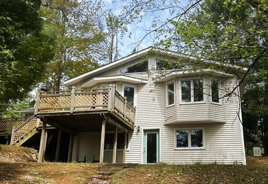 Lake Home For Sale in Atlanta, Michigan