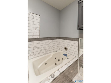 Beautiful townhome with loads of updates! Spacious living room - photo 12