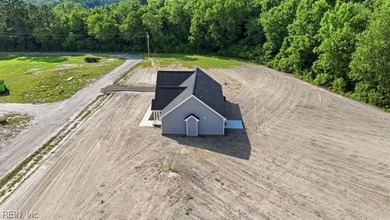 NEW CONSTRUCTION ON 10 PRIVATE ACRES! Welcome to the Mackenzi - photo 6