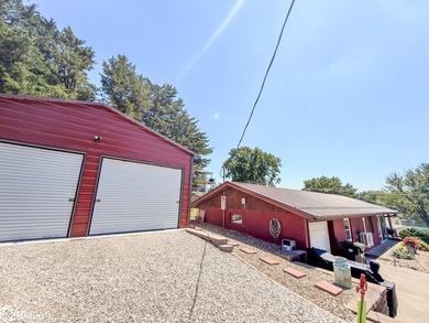 Nestled in a prime location with beautiful lake views, this - photo 1