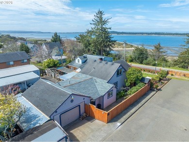 Take in the bay views while enjoying a blazing fire in this - photo 2
