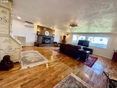 Take in the bay views while enjoying a blazing fire in this - photo 7