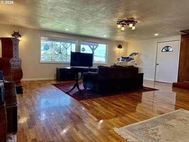 Take in the bay views while enjoying a blazing fire in this - photo 8