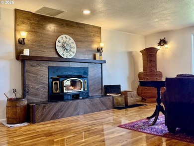 Take in the bay views while enjoying a blazing fire in this - photo 9