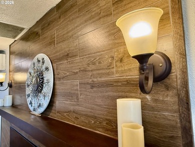 Take in the bay views while enjoying a blazing fire in this - photo 10