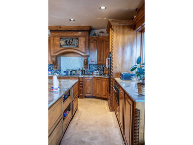 Nestled on a sprawling 550-acre estate, this extraordinary - photo 3
