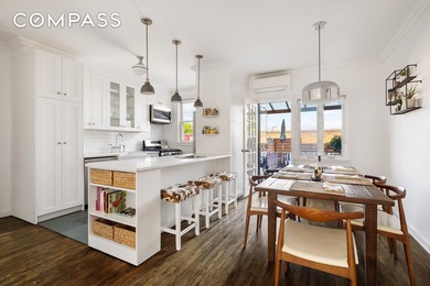This meticulously renovated townhouse at 17-05 Willoughby Avenue - photo 2