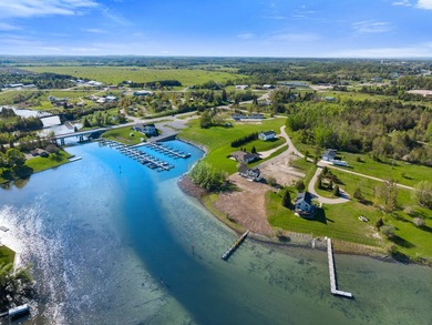 Brand new construction on the beautiful Cheboygan River! Enjoy - photo 4