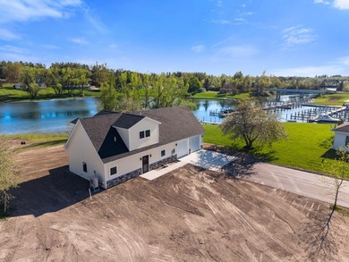 Brand new construction on the beautiful Cheboygan River! Enjoy - photo 8