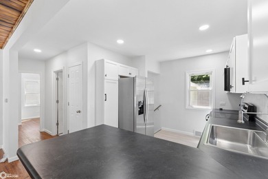 Beautifully remodeled and move-in ready, this charming home - photo 8