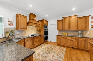 Set within the gated enclave of North Gate Manor, a sought-after - photo 11