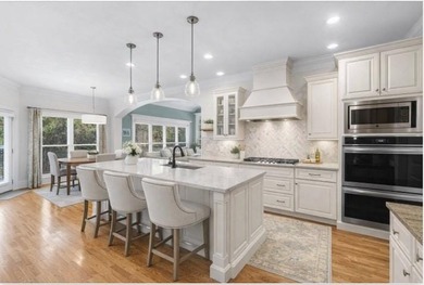 Set within the gated enclave of North Gate Manor, a sought-after - photo 13