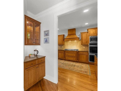 Set within the gated enclave of North Gate Manor, a sought-after - photo 17