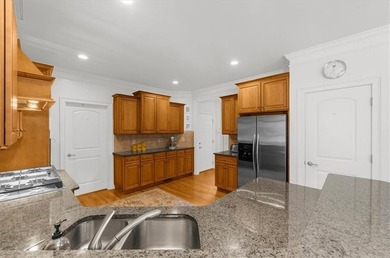 Set within the gated enclave of North Gate Manor, a sought-after - photo 20