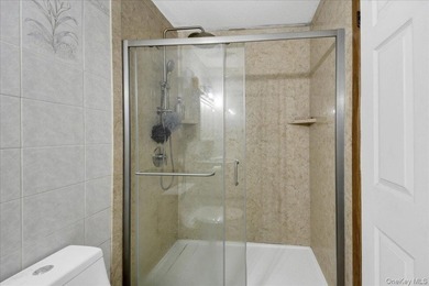 Discover this exceptional two-family residence in Castle Hill - photo 21