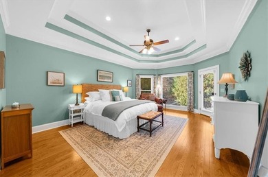 Set within the gated enclave of North Gate Manor, a sought-after - photo 21