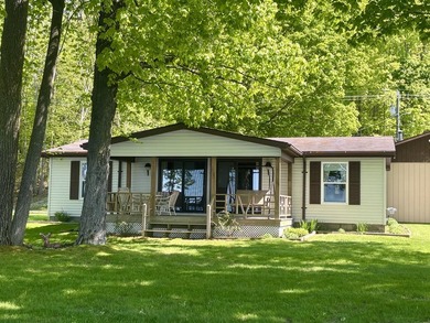 Meticulously maintained manufactured home on the shores of - photo 1