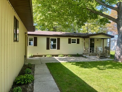 Meticulously maintained manufactured home on the shores of - photo 3