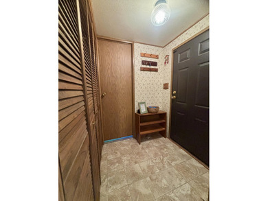 Meticulously maintained manufactured home on the shores of - photo 4