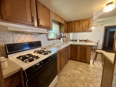 Meticulously maintained manufactured home on the shores of - photo 5